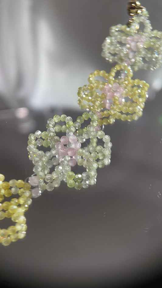Handmade floral beaded bracelet with yellow and pink crystal flower design, lightweight and elegant