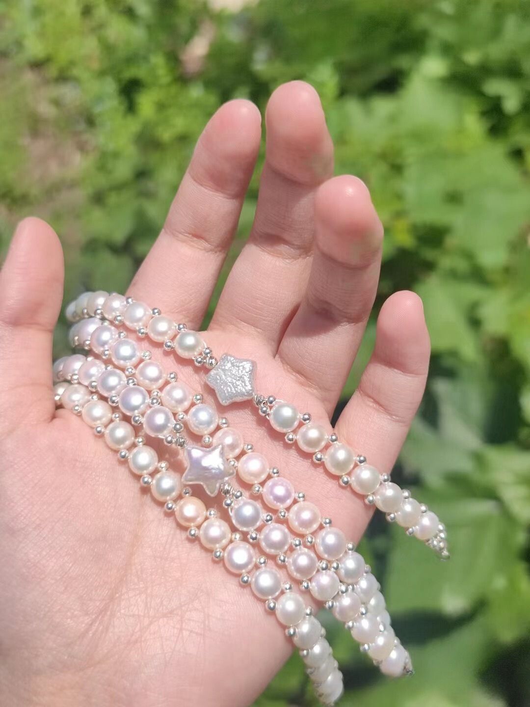 Natural freshwater pearls in pink aurora luster, perfect for handmade jewelry