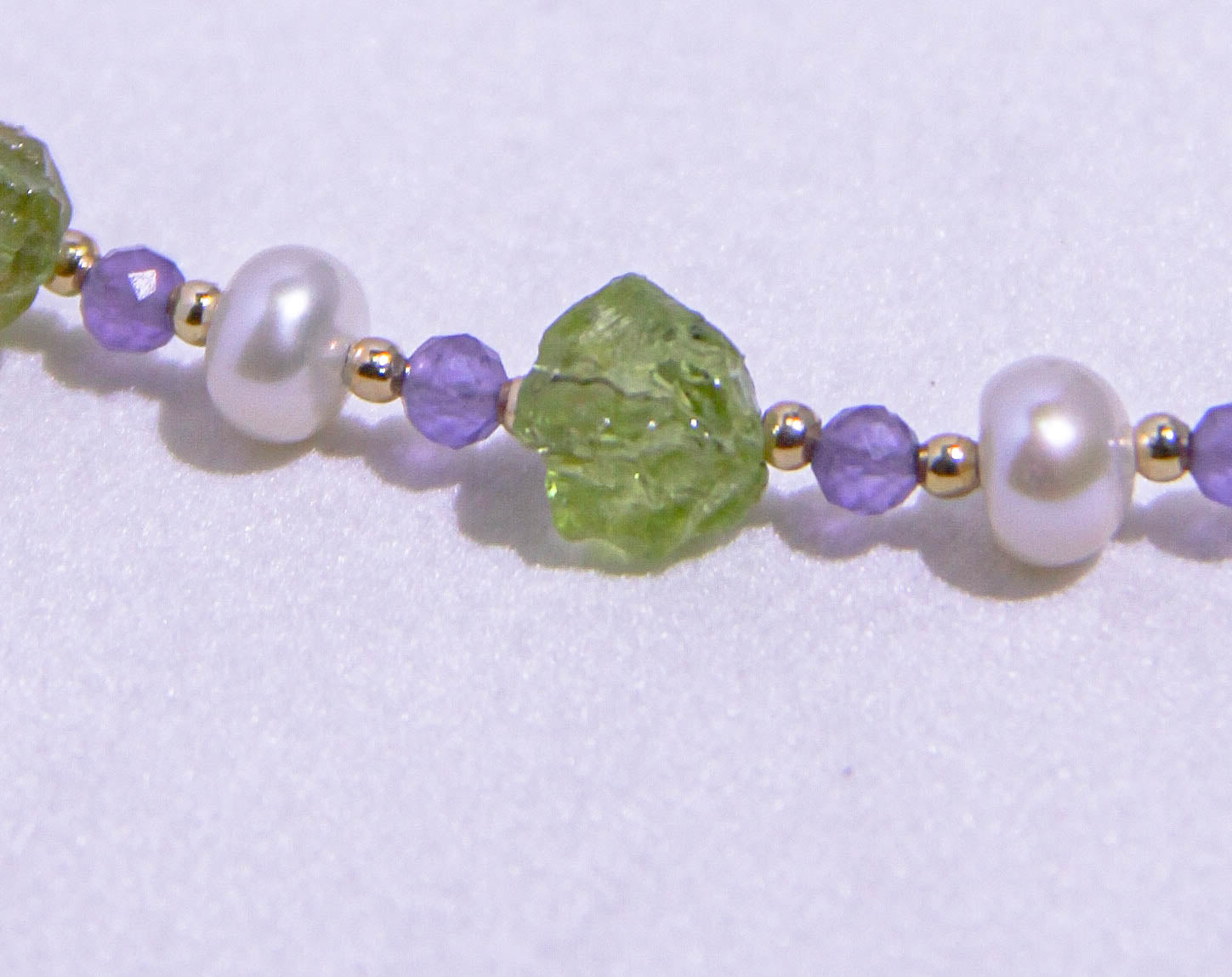 Adjustable Peridot Amethyst necklace with 5cm gold-plated chain extension for a custom fit